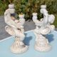 Pair of "cherub" candle holders in plaster
