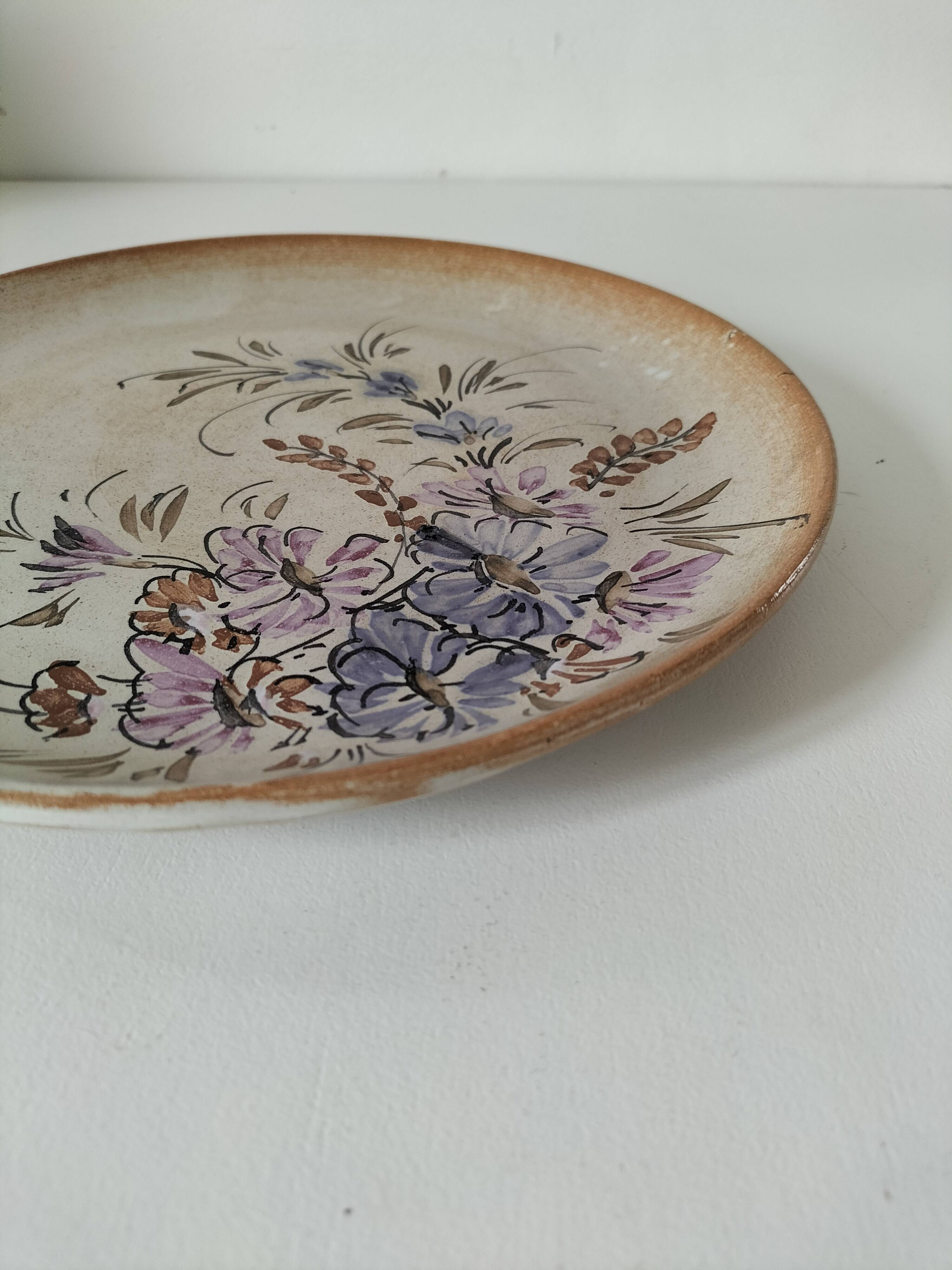 Stoneware plate with hand-painted floral decoration