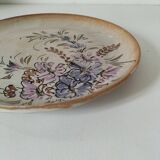 Stoneware plate with hand-painted floral decoration