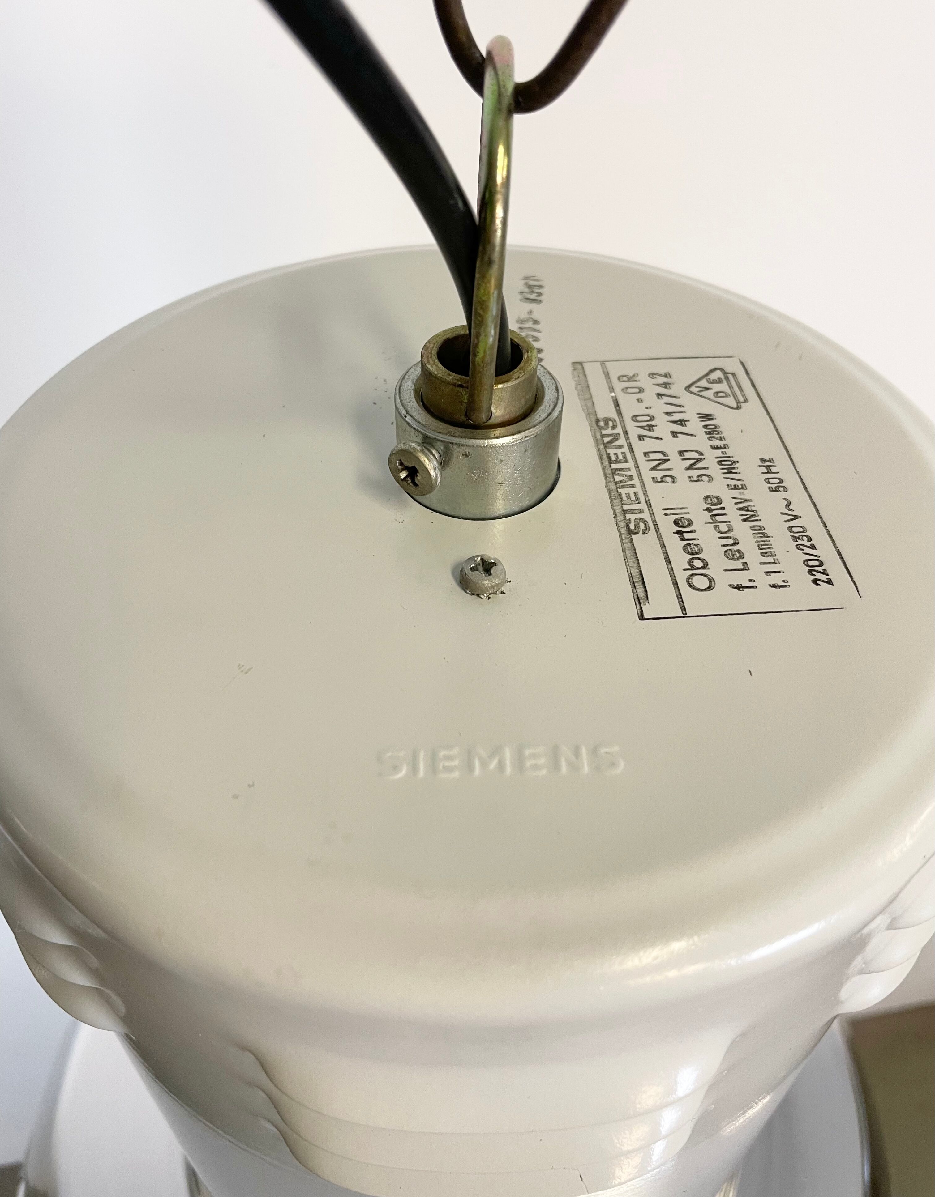 Industrial aluminium lamp with iron grid from siemens, 1980’s