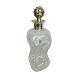 Blown glass carafe with silver frame and cap