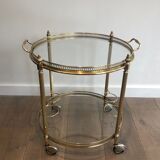 Neoclassical style rolling table in brass