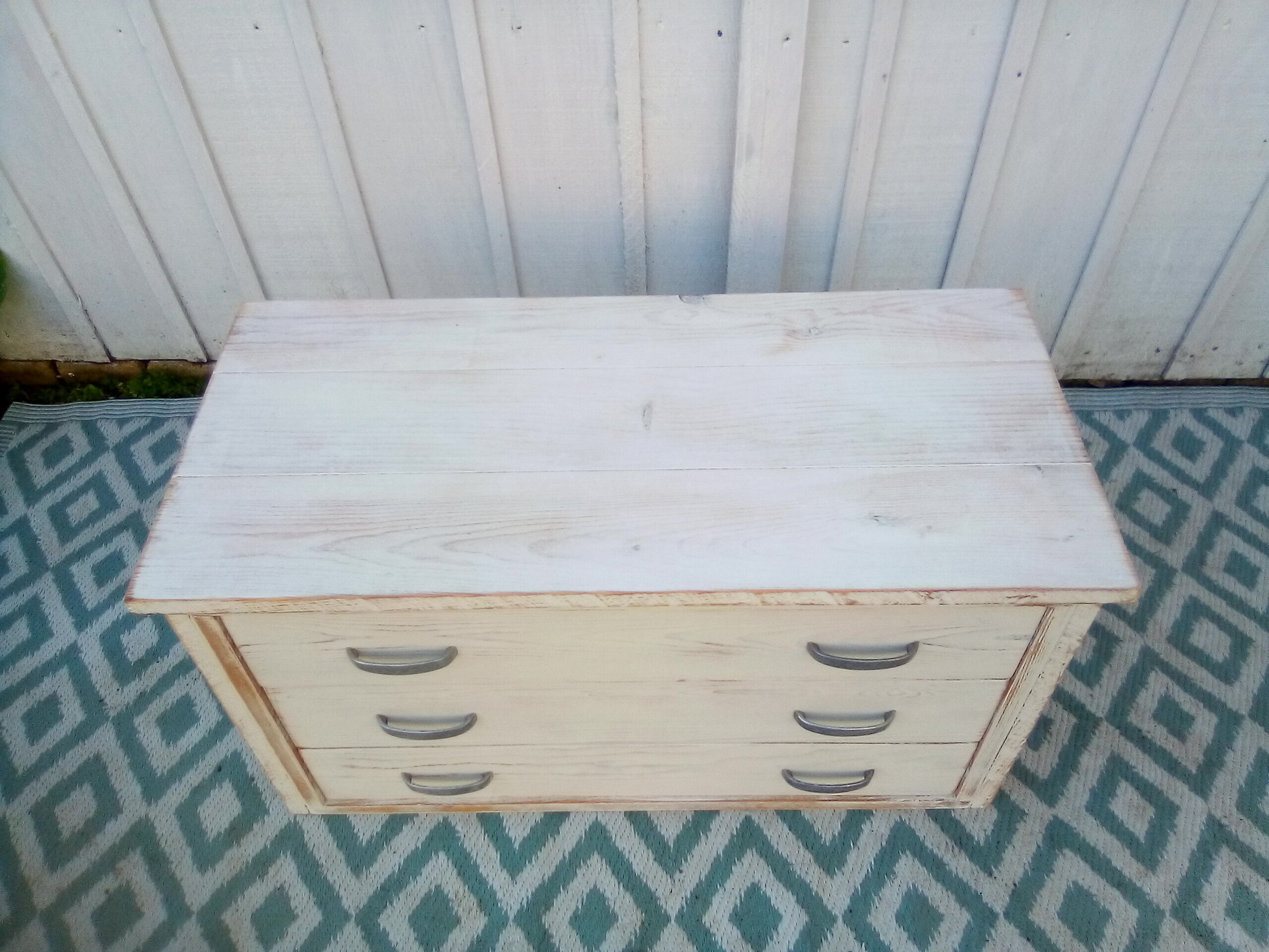 White patina low wooden commodity