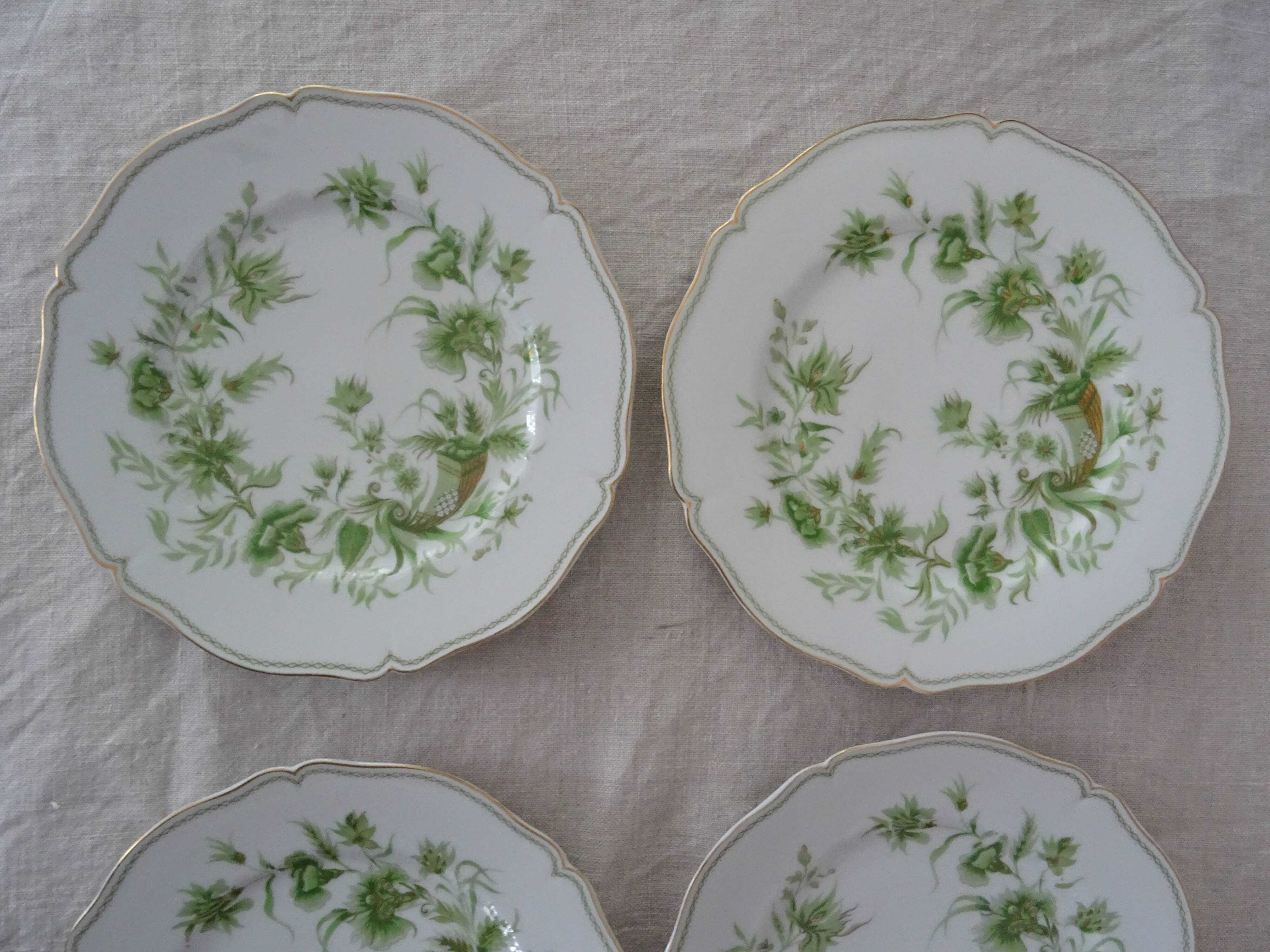 6 flat plates and 1 round dish haviland limoges with green and gold horn