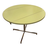 Round extendable folding Formica table with metal legs from the 50s/60s in green.