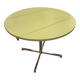 Round extendable folding Formica table with metal legs from the 50s/60s in green.