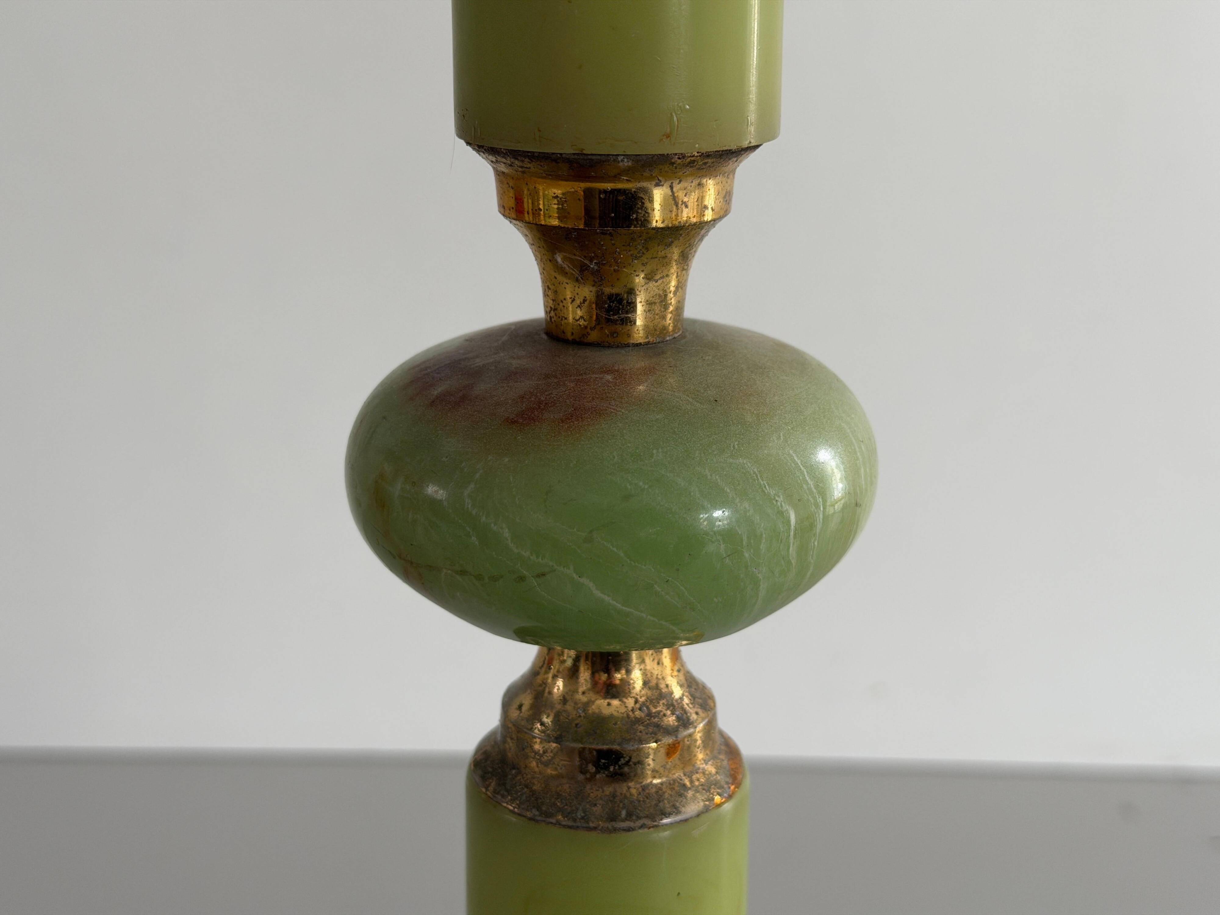Mid-century side table in green marble with a brass base, 1960s, Italy.
