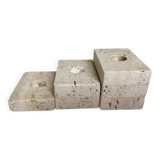 Trio of travertine candlesticks