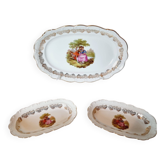 3 serving dishes with frangonard romantic scene with designs and borders in 24 carat gold.