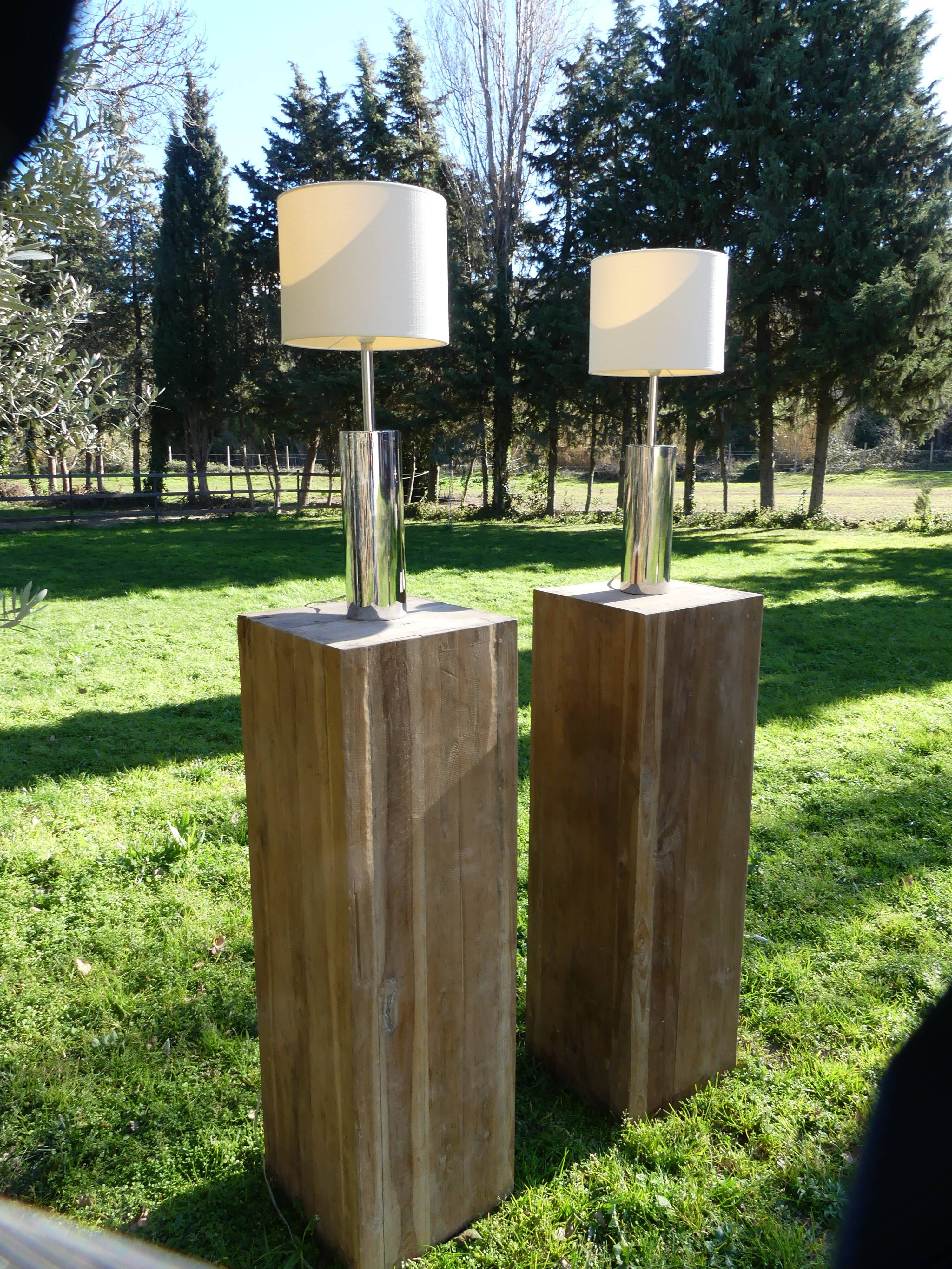 Foot of chrome lamps and ivory white lampshade