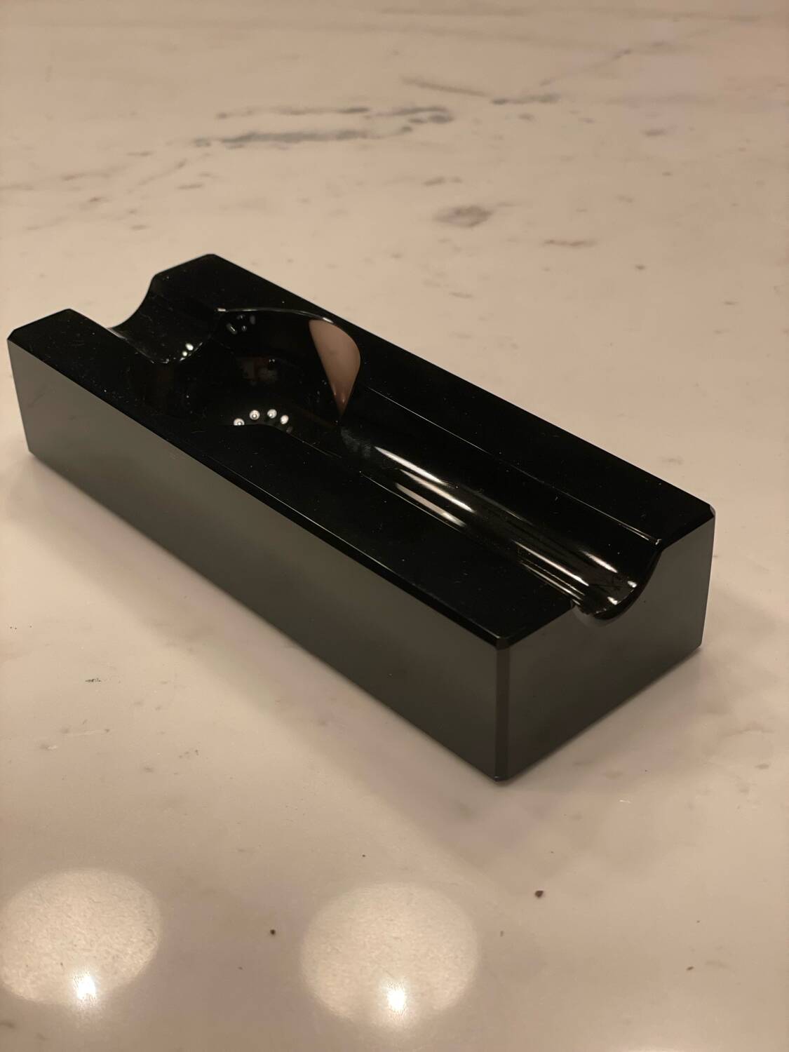 Individual cigar ashtray in black glass