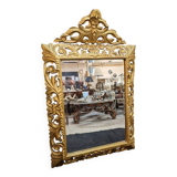 Large italian mirror in carved and gilded wood