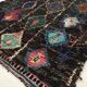 Moroccan Berber carpet Black Boucherouite with diamonds and colorful patterns 192x145cm