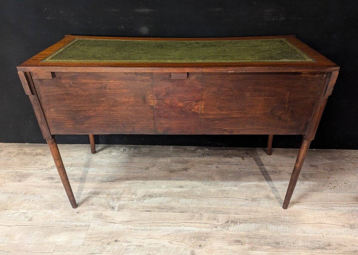 Art Deco desk in curved mahogany veneer.
