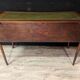 Art Deco desk in curved mahogany veneer.