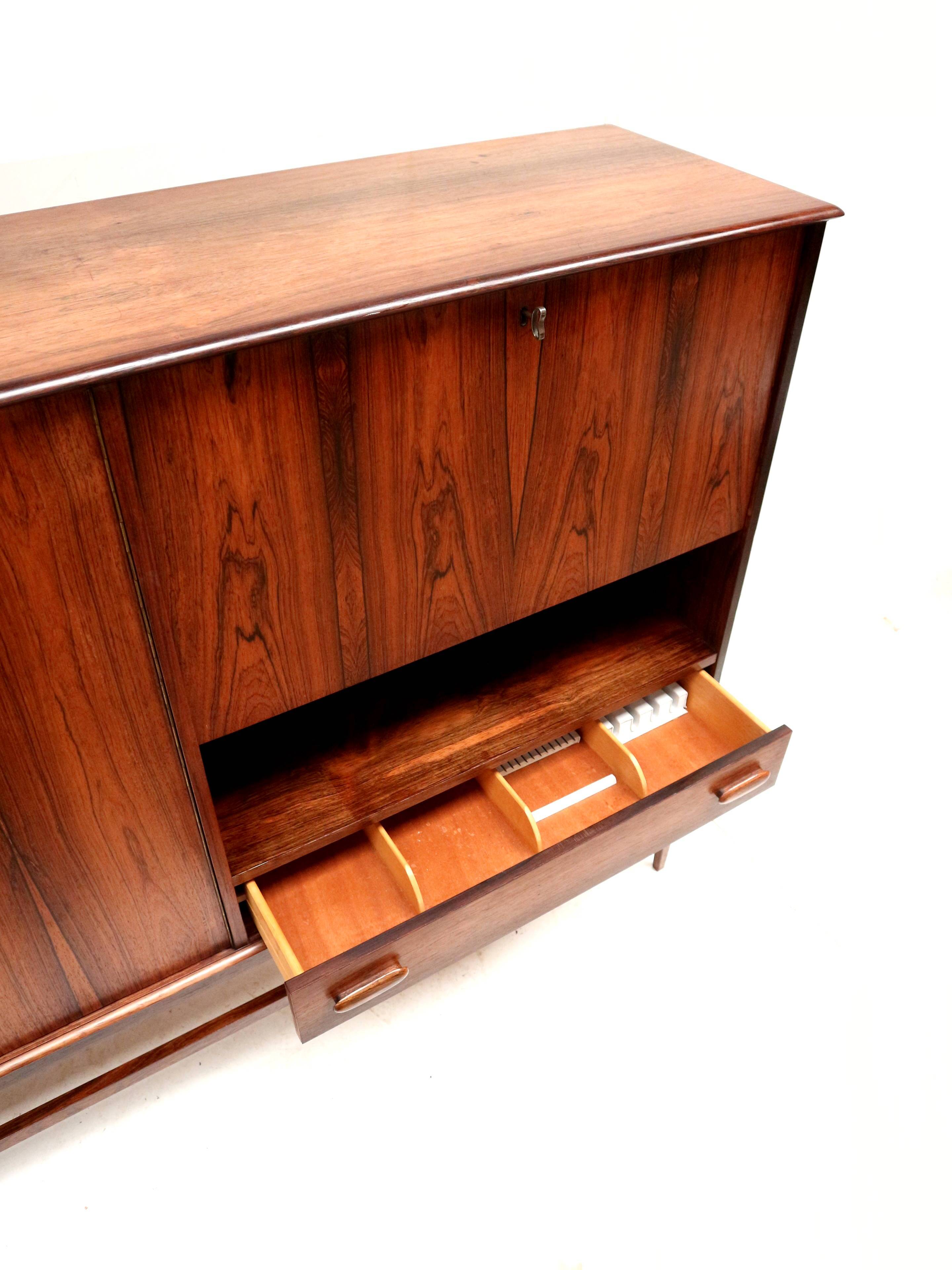 High quality vintage rosewood highboard / high sideboard made in the 60s