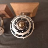 Duo of coat hooks, coat racks in wood and bronze porcelain