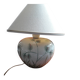 Antique ceramic lamp with floral decoration.