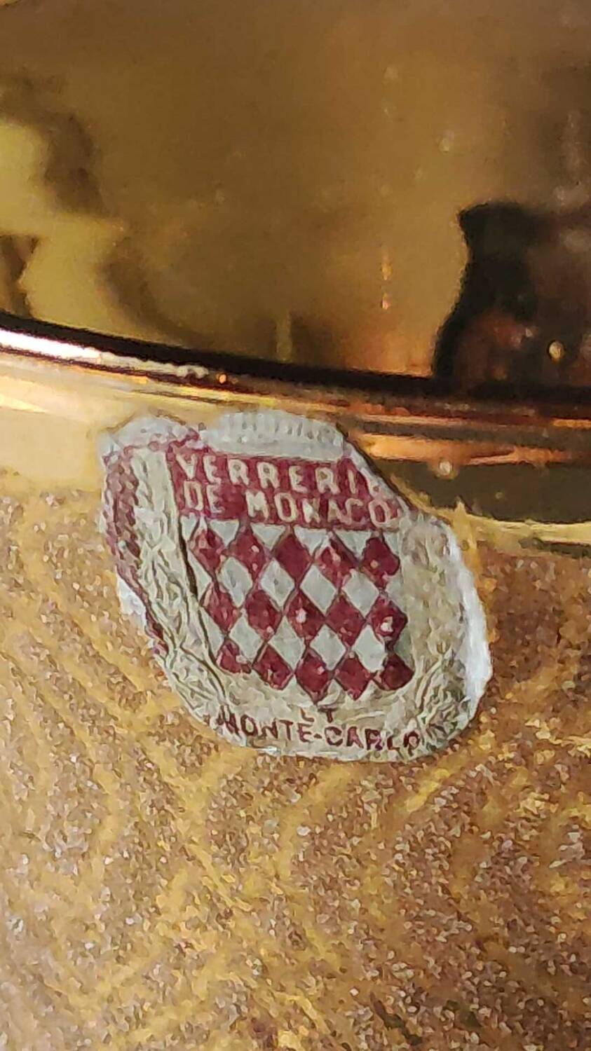 Ball vase stamped Verrerie de Monaco/Monte Carlo. In gold granite glass