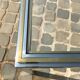 Table verre inox et laiton