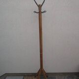 Old coat rack in blond wood, compass feet