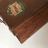 Suitcase of leather with labels of palaces