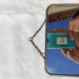 Barbier mirror with its chain around the 1950s vintage