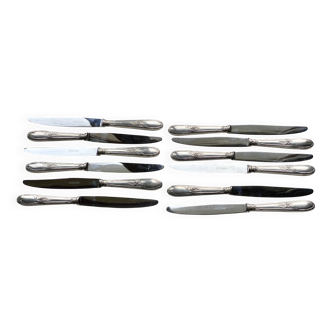 Set of 12 silver-plated metal table knives in Art Nouveau style.