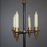 Candle holder in black metal and brass