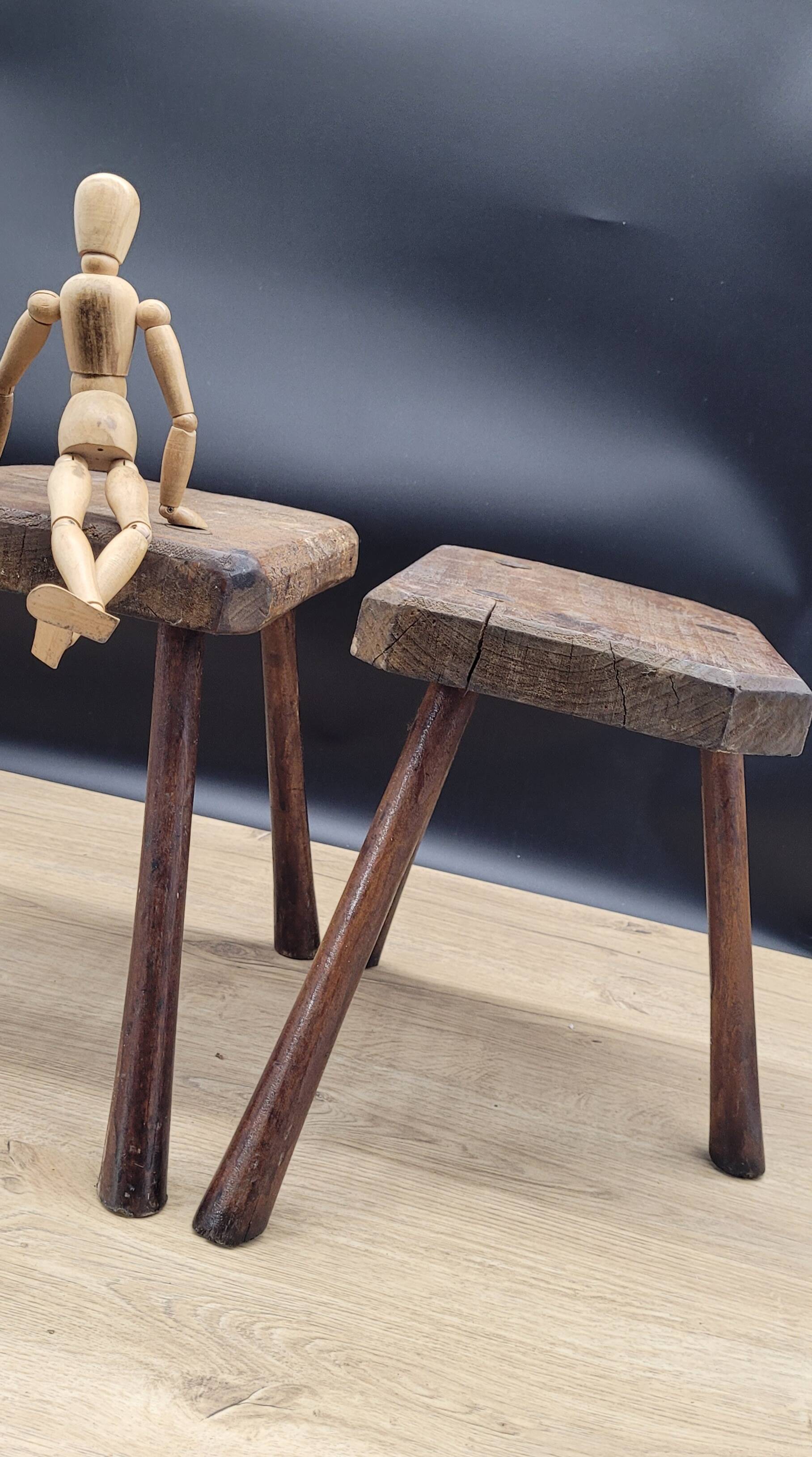 Pair of solid octagon cowhide tripod stools