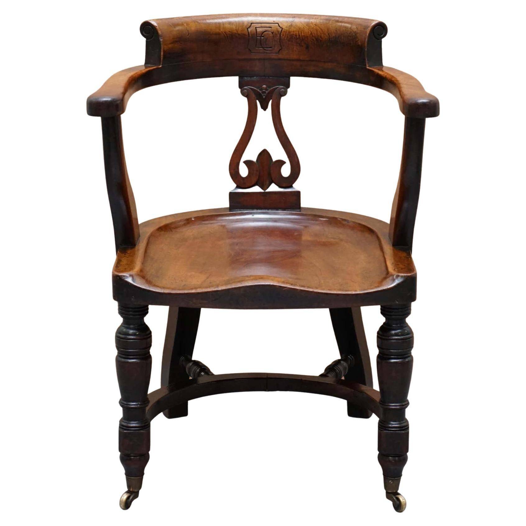 Victorian captain's chair in walnut from Eton College