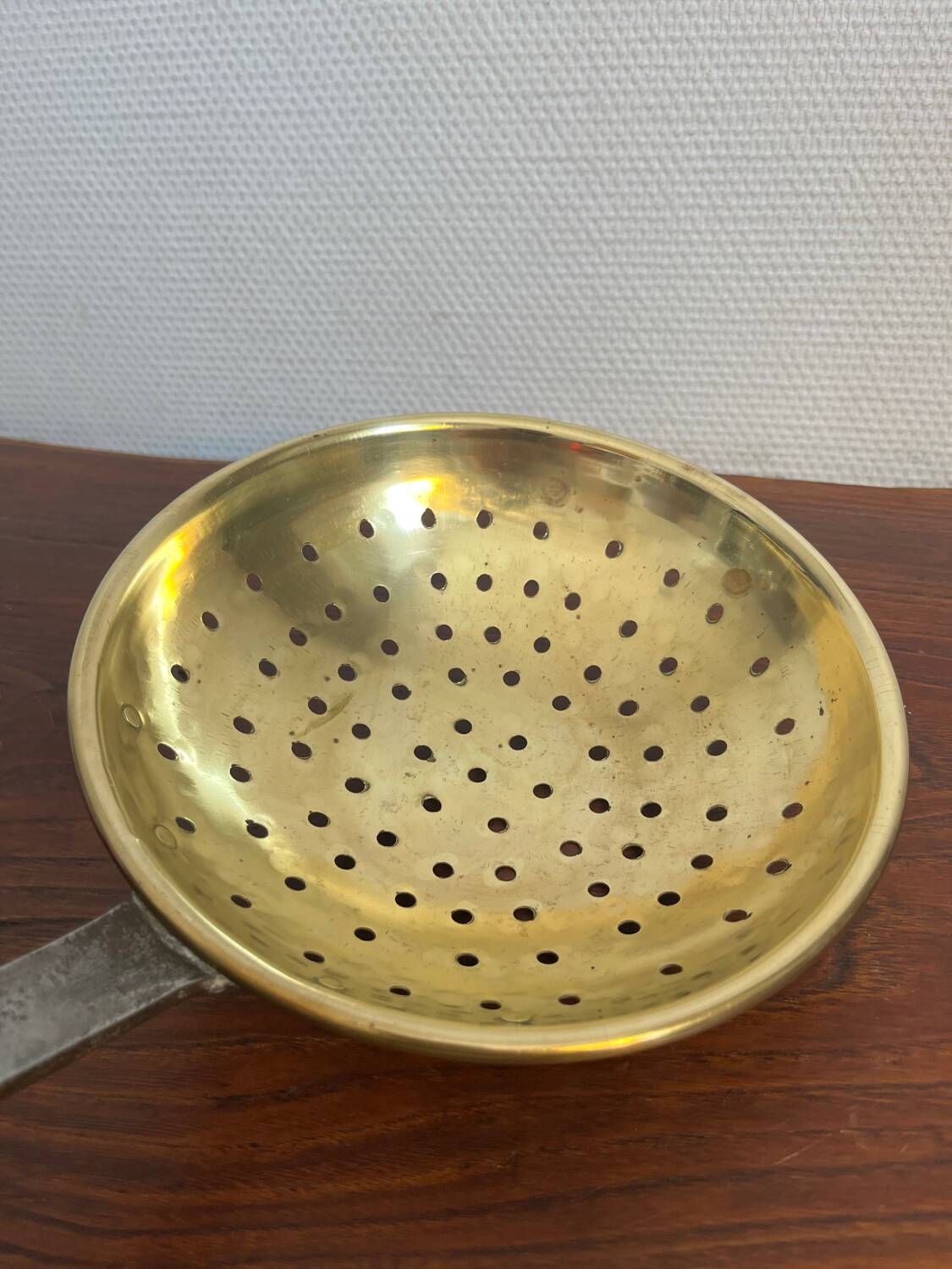 Large skimmer in brass and wrought iron, early 20th century