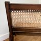 Vintage wooden and cane armchair