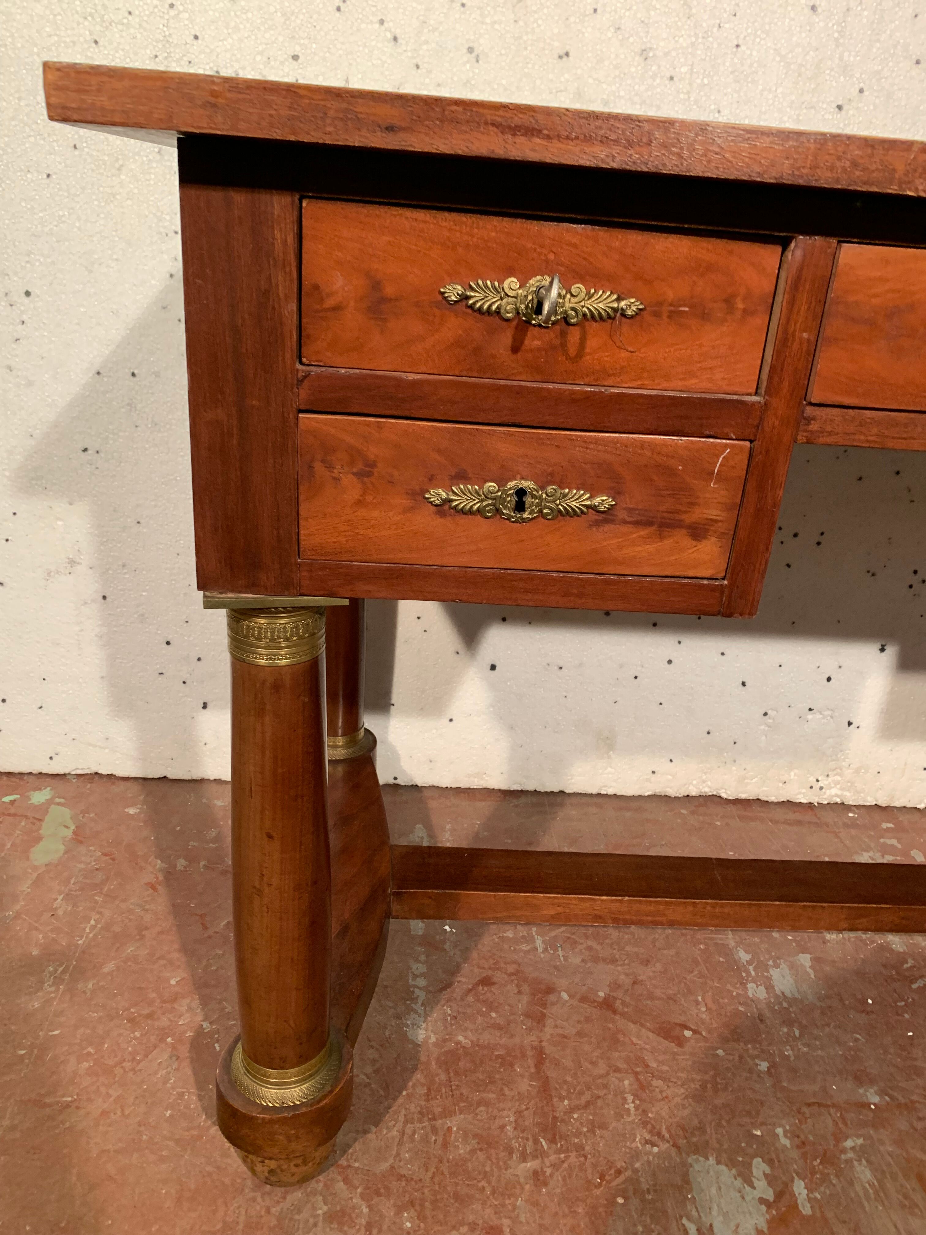 Empire style desk in mahogany and XX century veneer