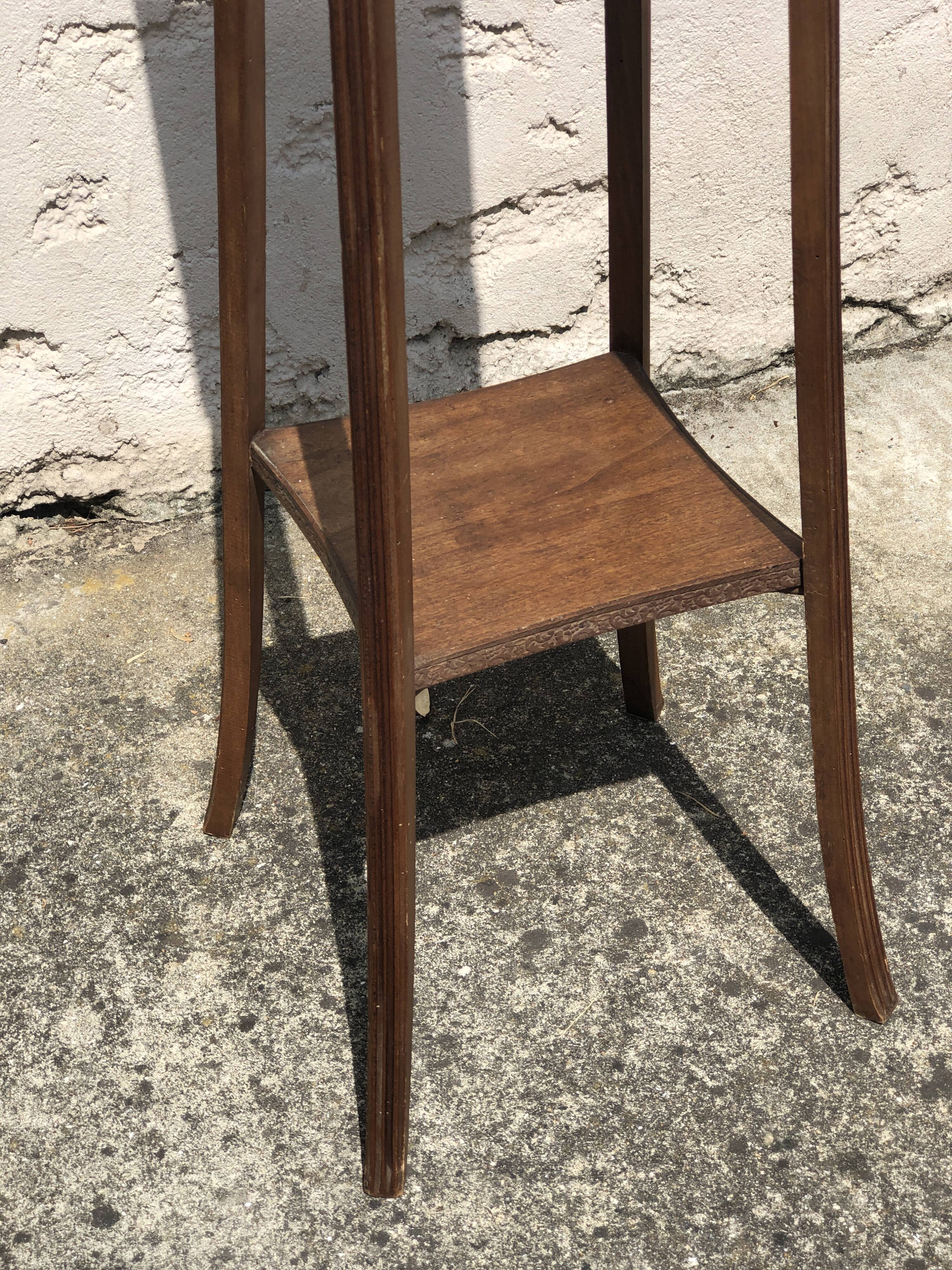 High harness in light wood, carved floral details