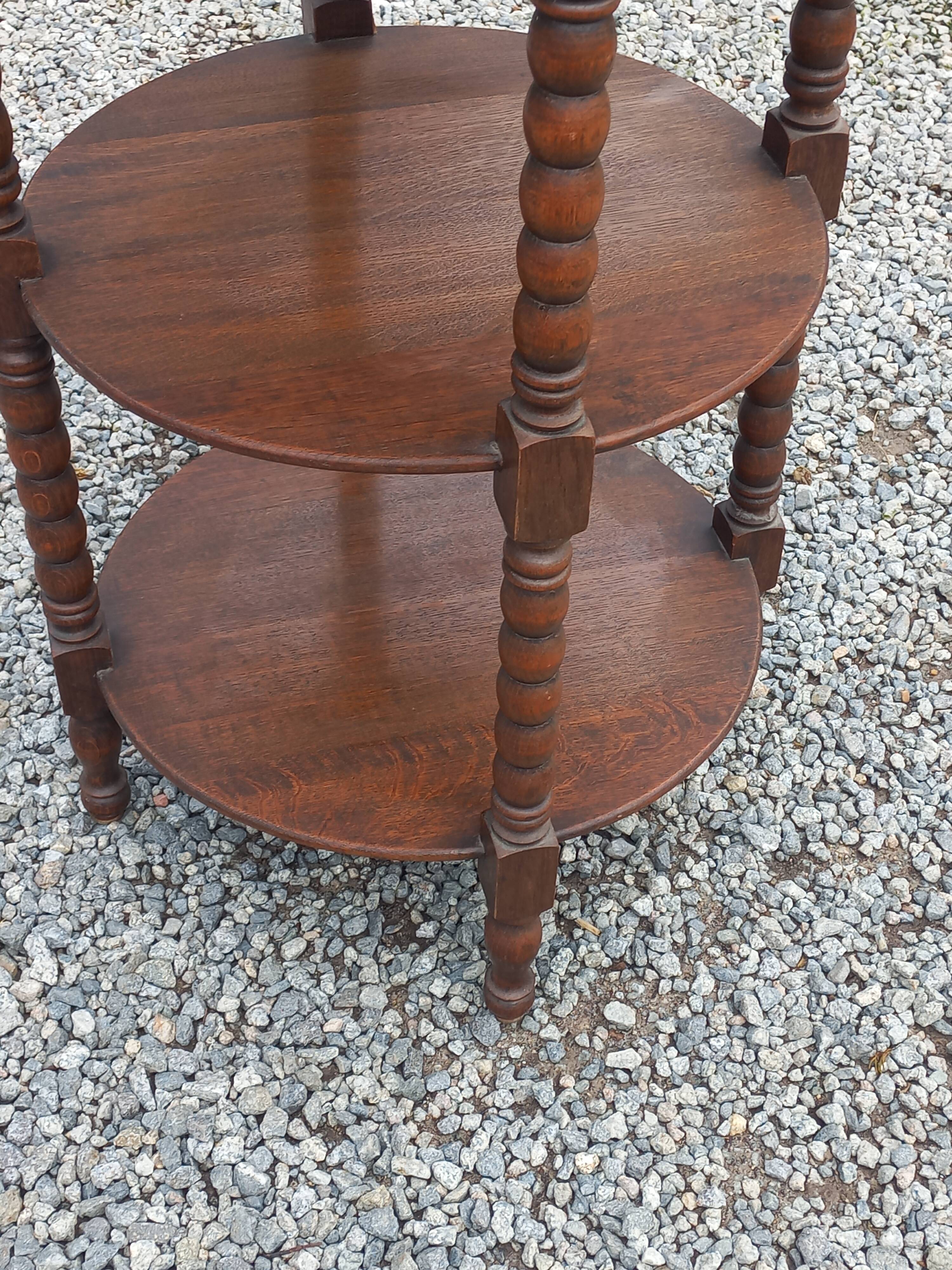 Vintage oak pedestal table with 3 shelves from the 60s