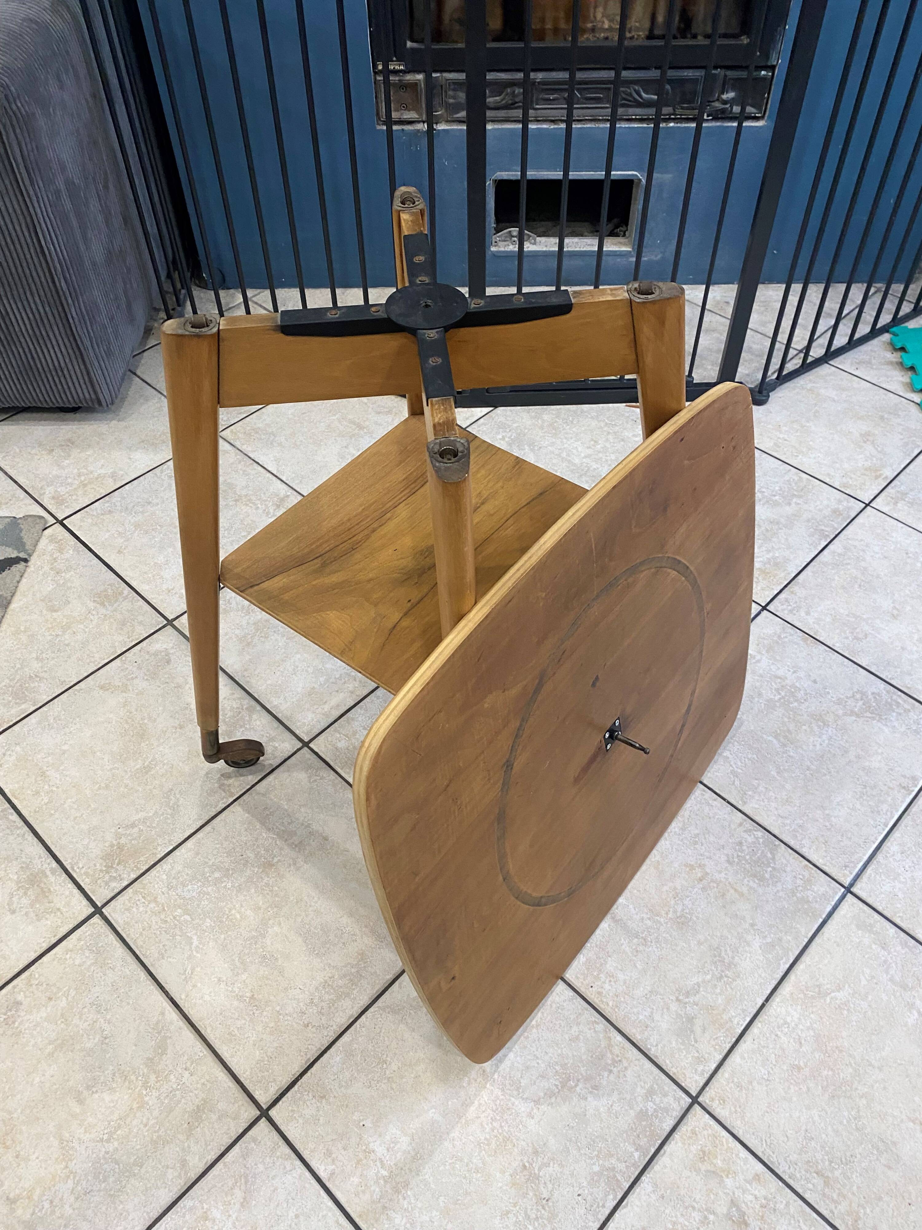 Scandinavian vintage 50s wooden side table with a swivel top.