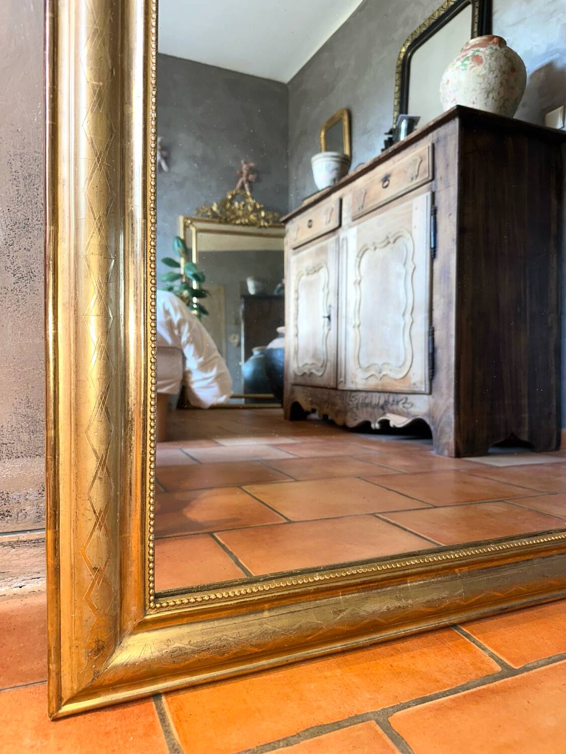 Antique gilded Louis-Philippe mirror, 19th century.