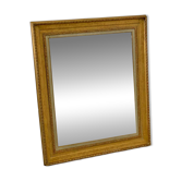 Wood and gilded stucco mirror in Louis XVI style