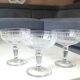 Lot of 4 x Champagne Coupes in Baccarat crystal. Engraved decoration with Greek friezes.