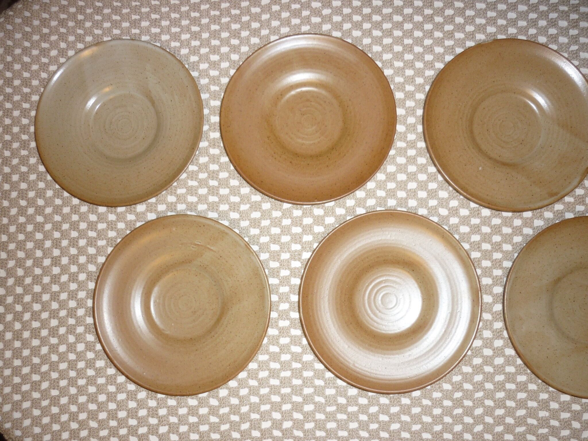 Pair of CNP Village France stoneware saucers