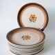 Set of 9 flat plates in Gien stoneware with flowers 1970