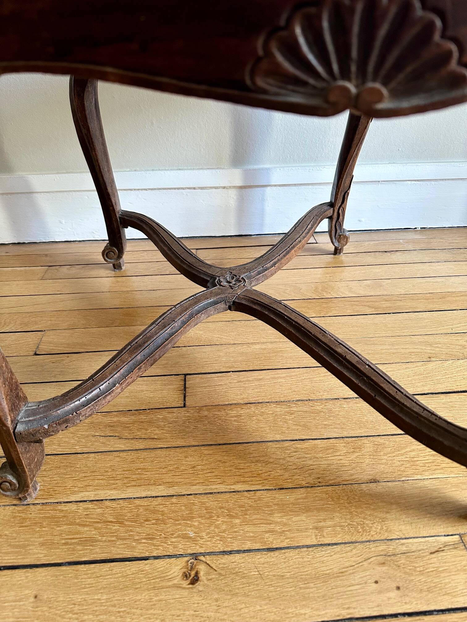 A pair of Regency armchairs with a stretcher.