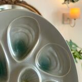 11 oyster plates 1960.