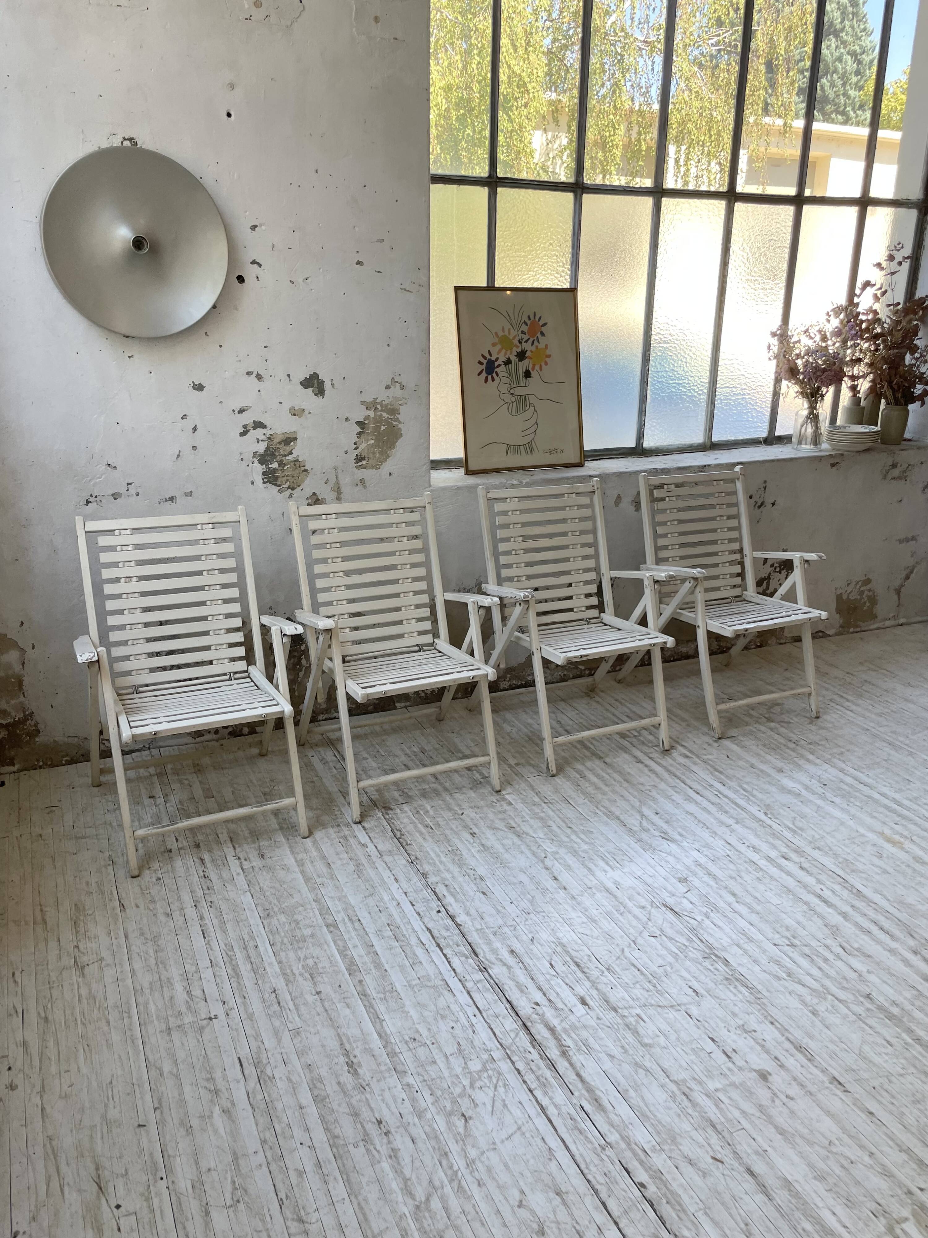 4 white wooden garden chairs
