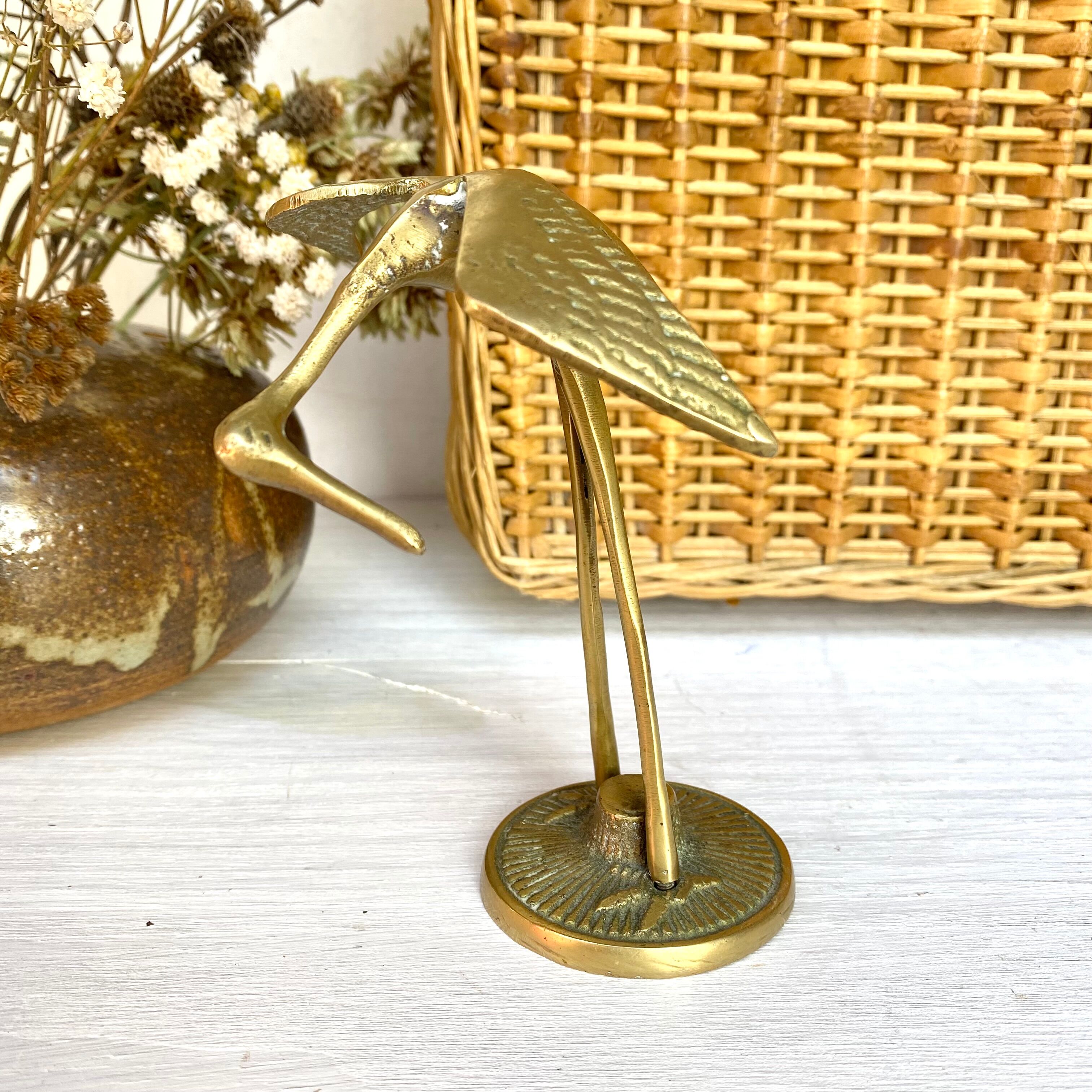 Golden brass bird