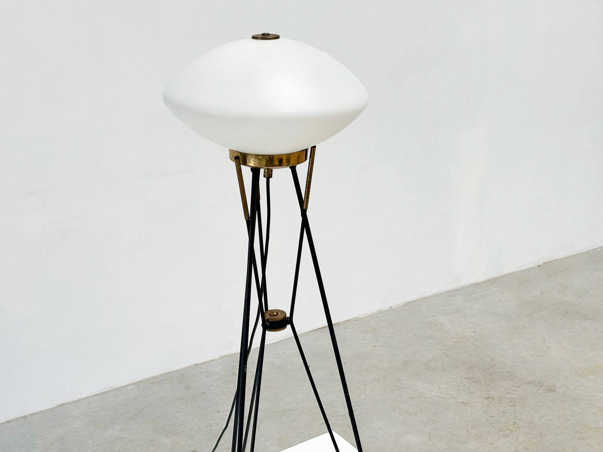 Elegant Italian floor lamp with a white opaline shade.