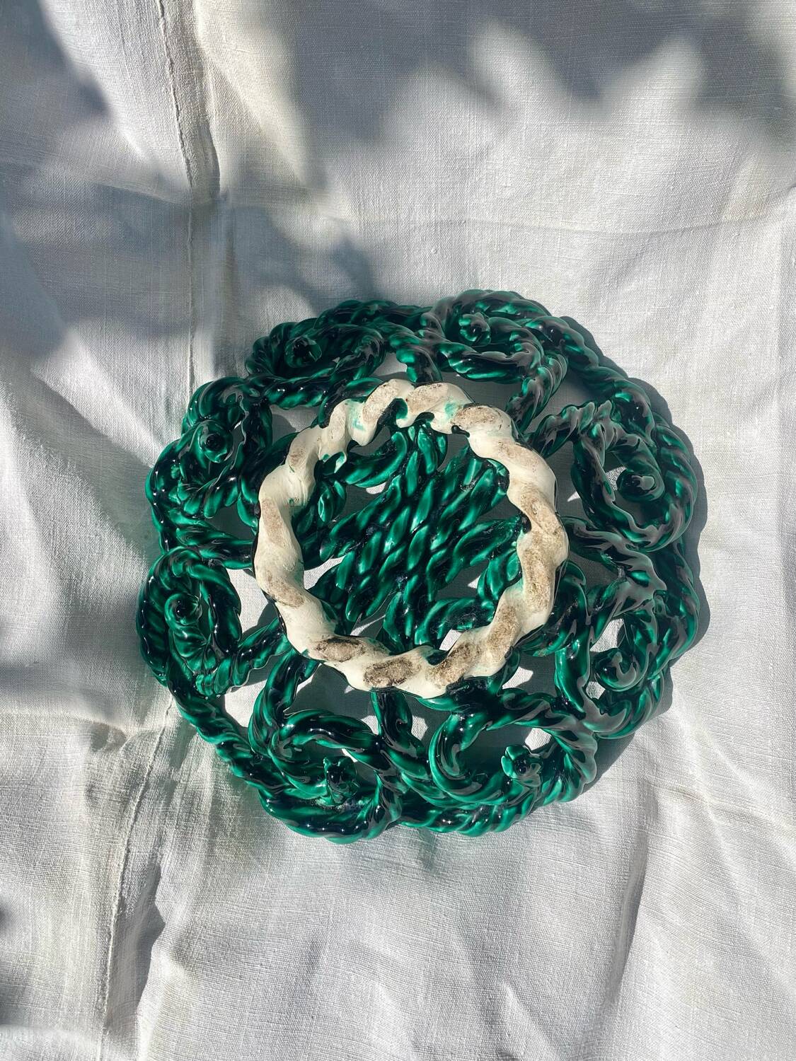 Large twisted green enamelled bowl