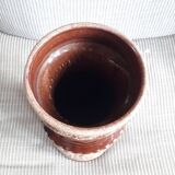 Large ceramic vase from Germany with floral decoration.