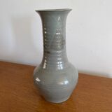 Glazed stoneware based, signed.